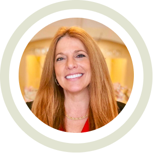 Anne T headshot green background