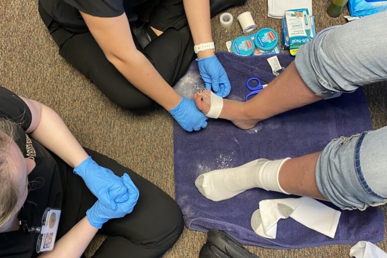 Feet First: Nursing Majors Provide Compassionate Care for Hope Missions Guests