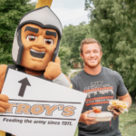 Troy's order with mascot and student