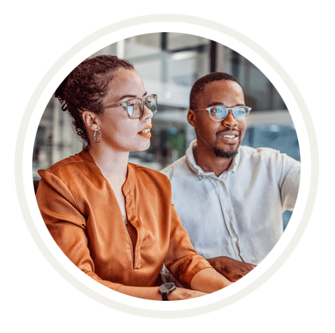 why au students looking at computer.png