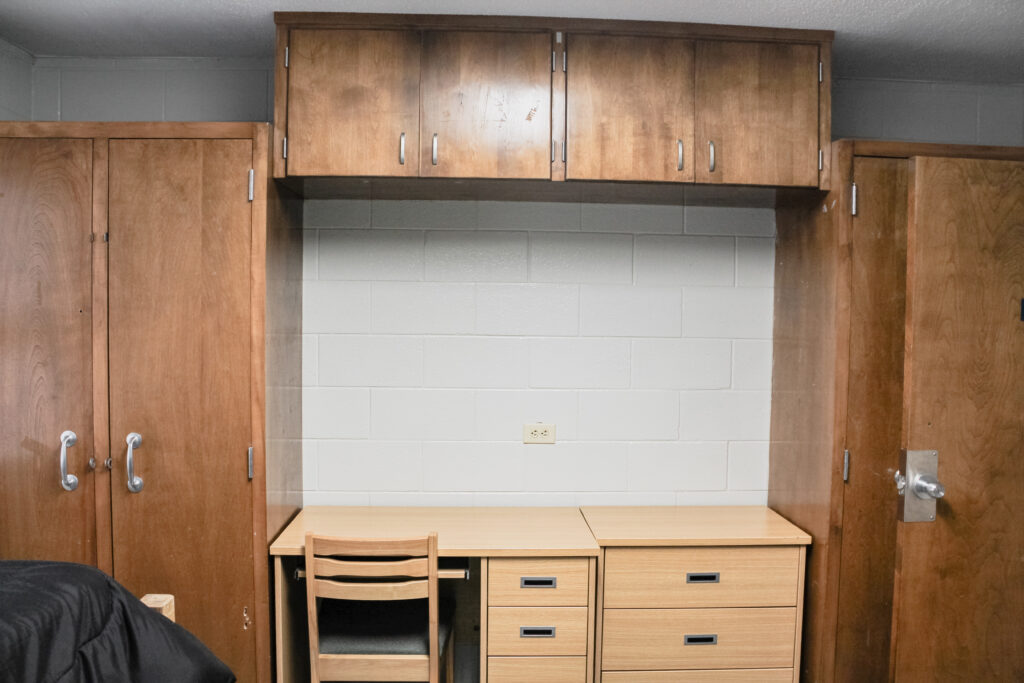 Stringer Apartment Residence Halls bedroom with double closets and desk