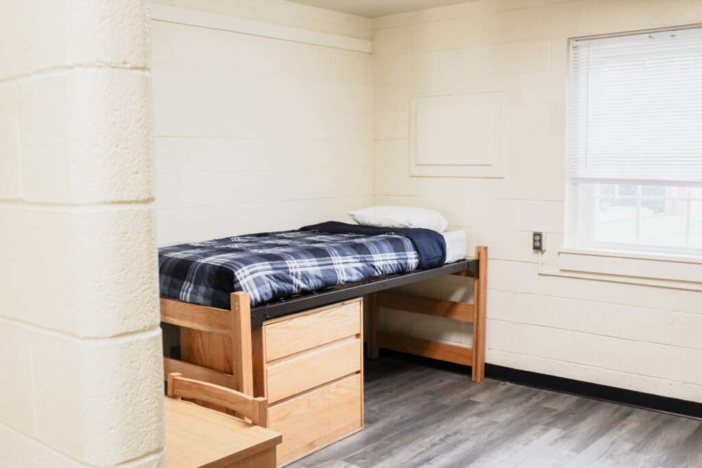 Lawton Hall bedroom with window, bed, and desk