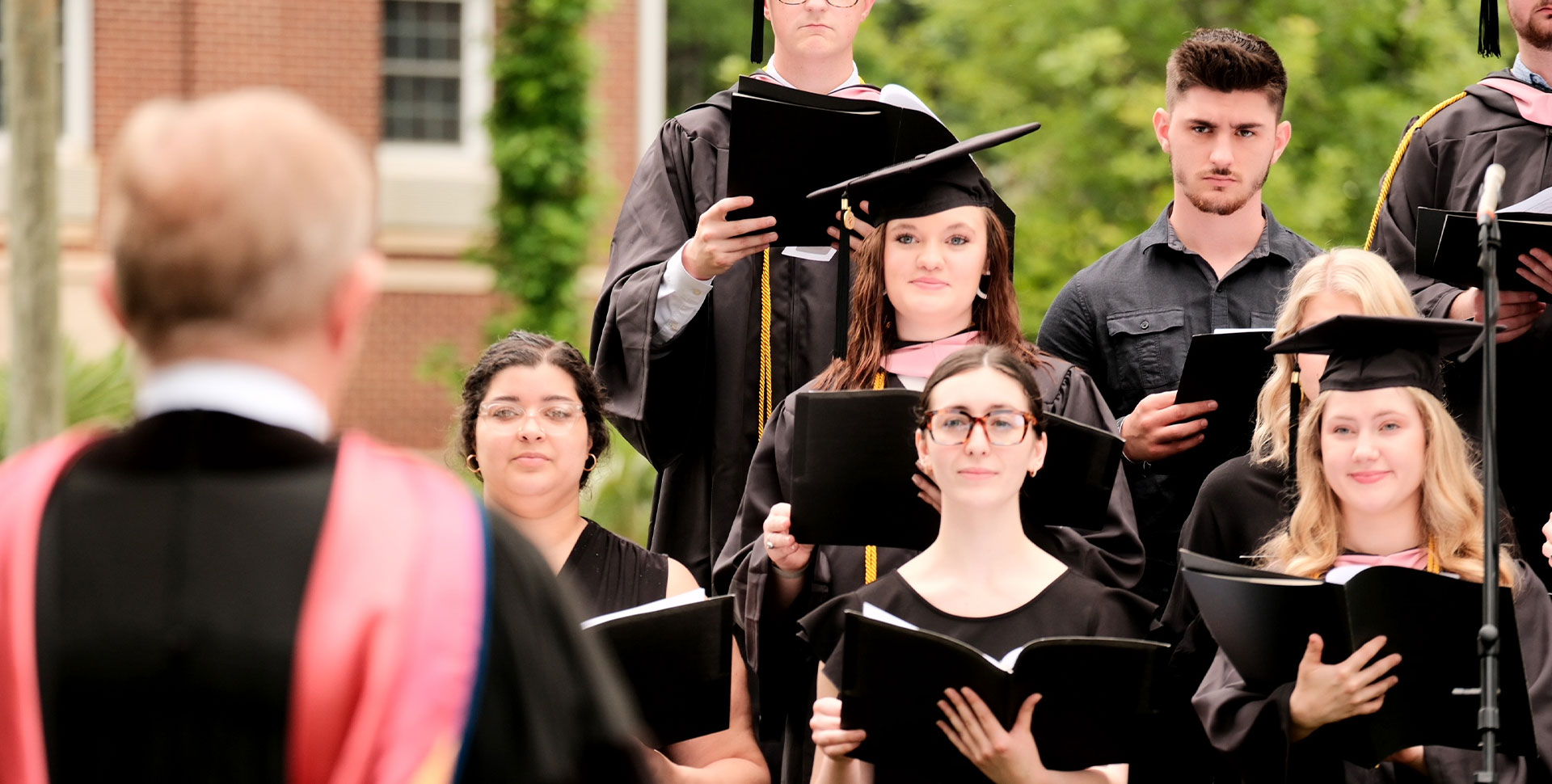 Alumni chorus singing at commencement