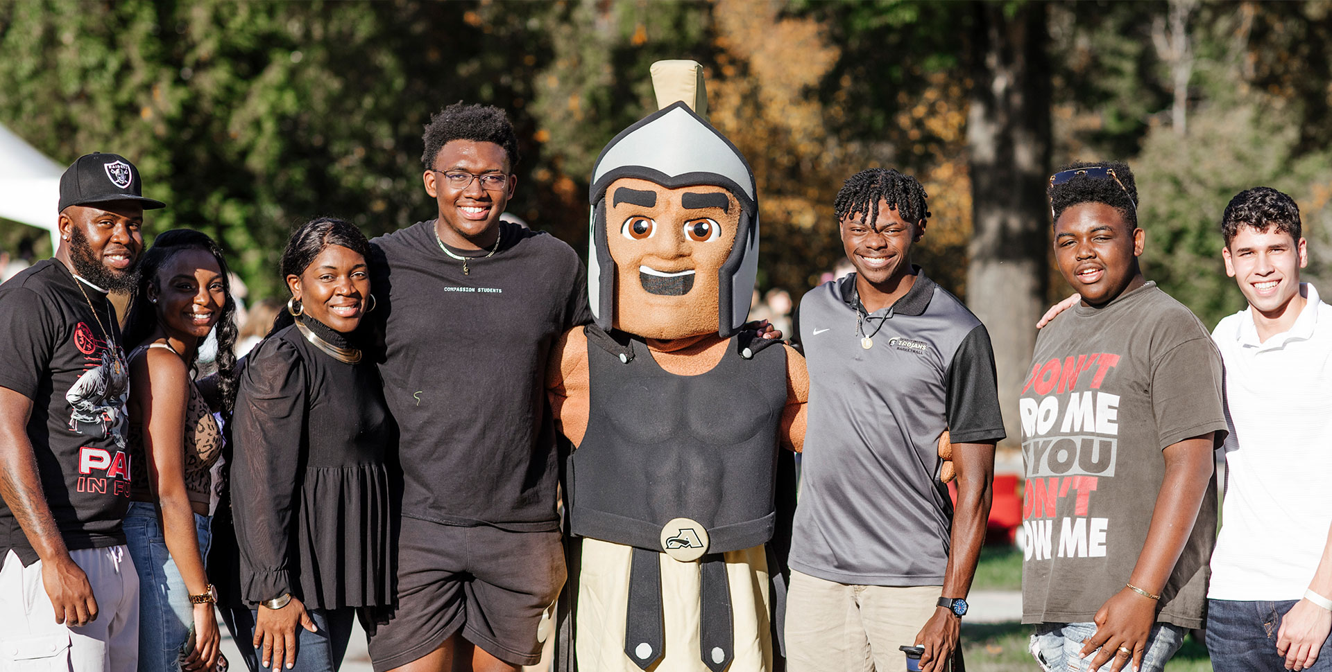 Students gathered around Trojan Mascot